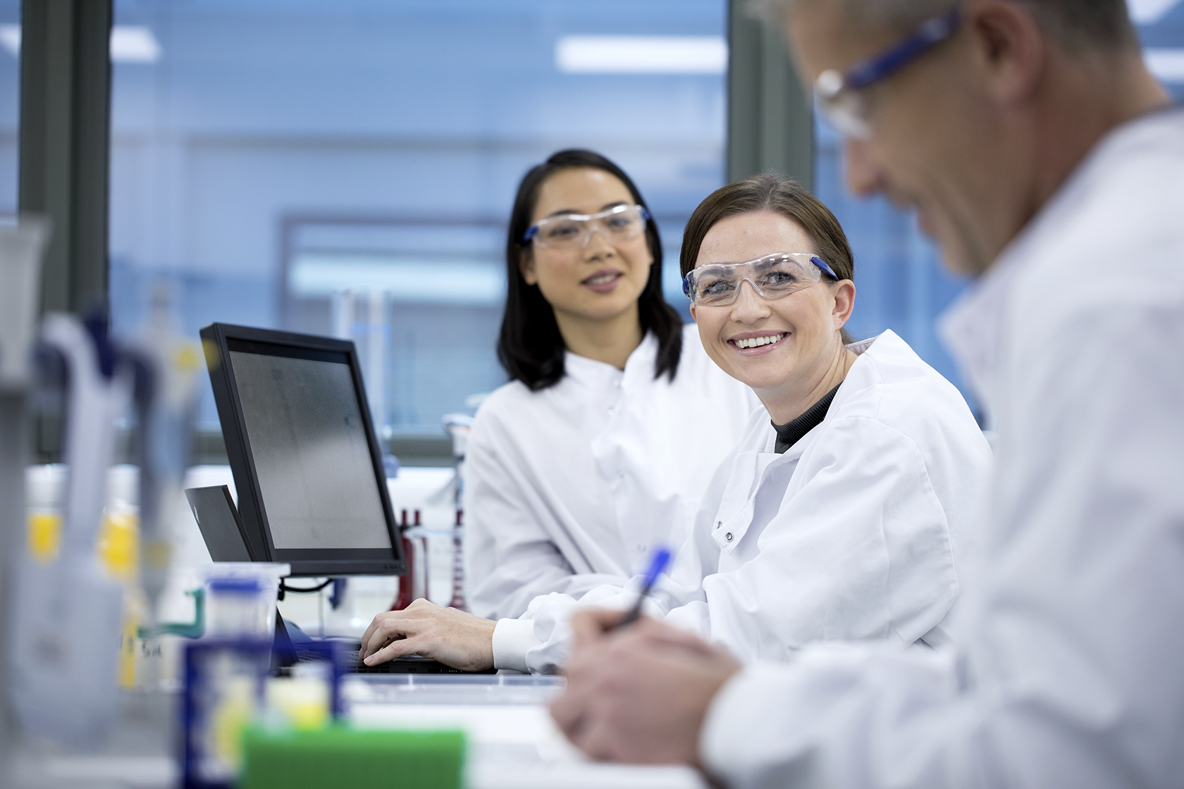 Scientists working in a modern laboratory